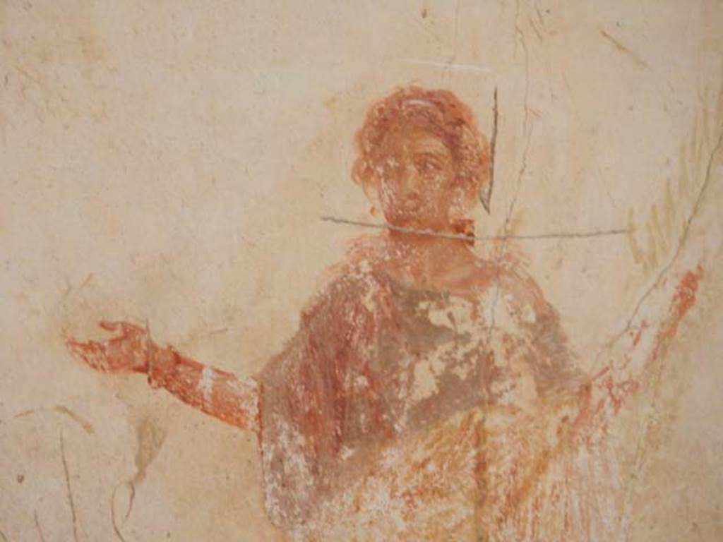 VI.8.23 Pompeii. May 2017. Detail of painted flying figure with palm branch in her left hand. Photo courtesy of Buzz Ferebee.