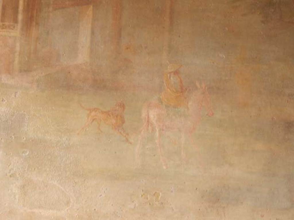 VI.8.23 Pompeii. May 2017. Detail from centre of sacred landscape showing a man on a mule with a dog following behind. Photo courtesy of Buzz Ferebee.