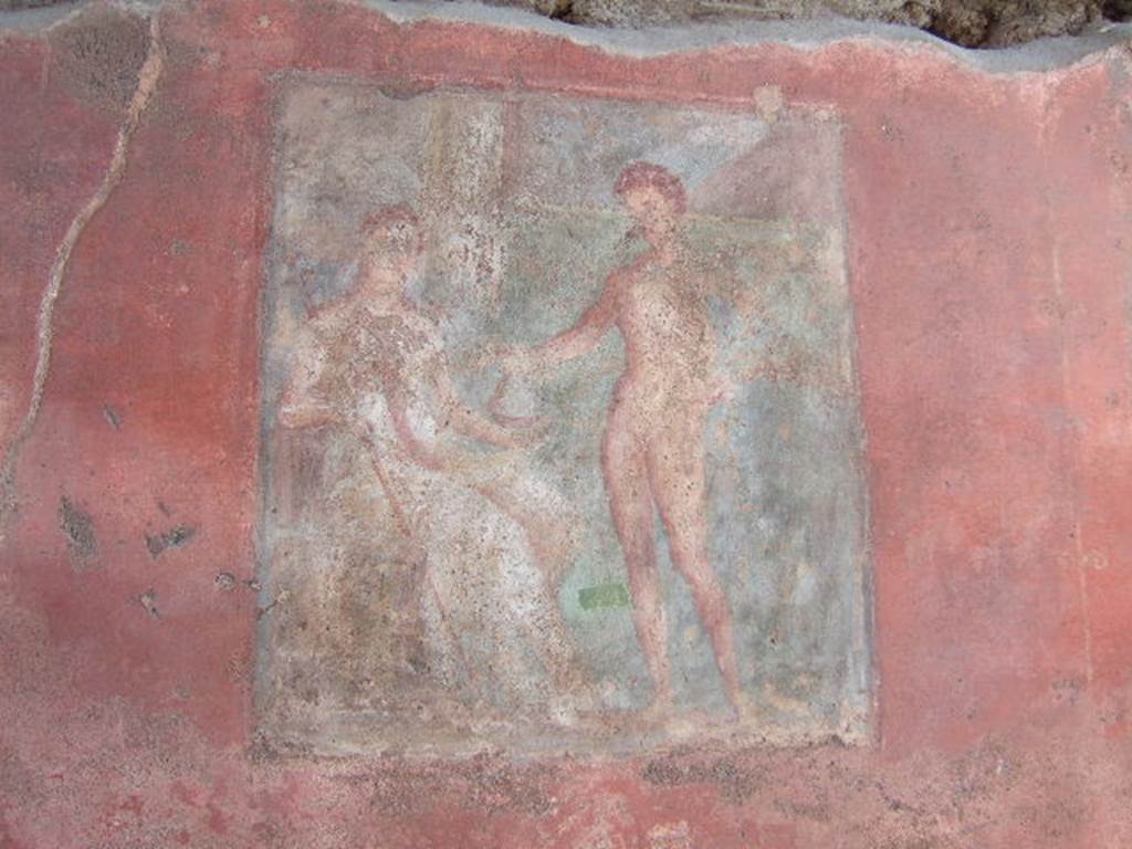 VI.9.2 Pompeii. September 2004. South side of entrance corridor 1. Helbig and Schefold identify the wall painting as Demeter and Hermes. Winsor Leach states “Mercury looks complicitously at the viewer as he drops a fat purse into the outstretched hand of Ceres, seated with her torch by her side”. See Helbig, W., 1868. Wandgemälde der vom Vesuv verschütteten Städte Campaniens. Leipzig: Breitkopf und Härtel. (362) See Schefold, K., 1962. Vergessenes Pompeji. Bern: Francke. (T. 169,2). See Winsor Leach, E., 2004. The Social Life of Painting in Ancient Rome and on the Bay of Naples. Cambridge UK: Cambridge UP.