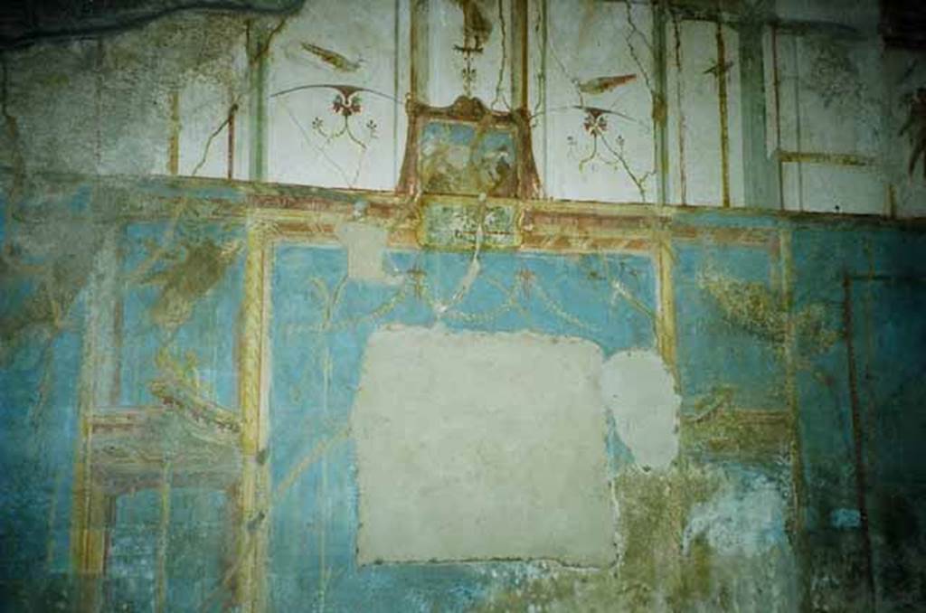 VI.9.2 Pompeii. May 2010. Room 29, south wall with painted wall decoration, and site of removed painting of Apollo and Hermes. Photo courtesy of Rick Bauer.
