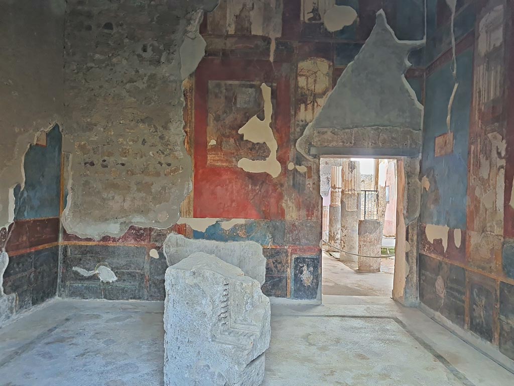 VI.9.6 Pompeii. November 2023.
Room 8, looking towards west wall through window from garden area, with doorway into atrium, on right.
Photo courtesy of Giuseppe Ciaramella.