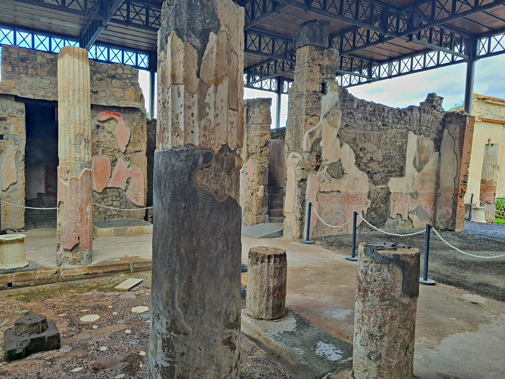 VI.9.6 Pompeii. November 2023.
Room 3, looking north-east across impluvium in atrium, with north wall of tablinum, on right. Photo courtesy of Giuseppe Ciaramella.