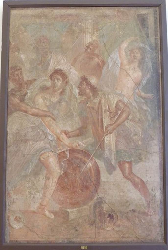 VI.9.6 Pompeii. Found on 18th June 1828 in room 9, on the south wall of the tablinum. Centre panel. Wall painting of Achilles discovered by Ulysses at Skyros. Now in Naples Archaeological Museum. Inventory number 9110.
See Helbig, W., 1868. Wandgemälde der vom Vesuv verschütteten Städte Campaniens. Leipzig: Breitkopf und Härtel. (1297).