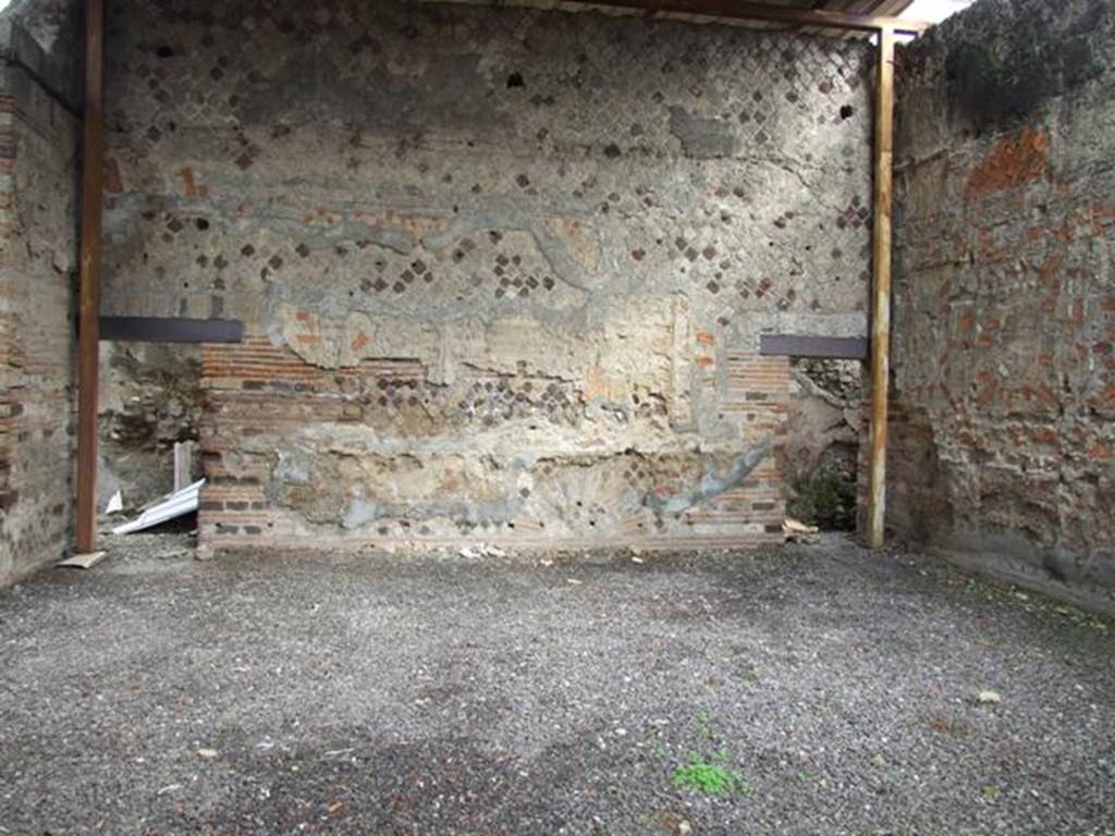 VI.9.6 Pompeii. March 2009. Room 22, large exedra, this was revetted in its entirety in marble veneer. Looking east towards doorways into rear corridor 26. See Winsor Leach, E., 2004. The Social Life of Painting in Ancient Rome and on the Bay of Naples. Cambridge UK: Cambridge UP.