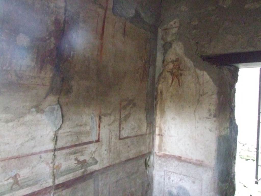VI.10.1 Pompeii. March 2009. South-west corner of rear room, with doorway into front room.