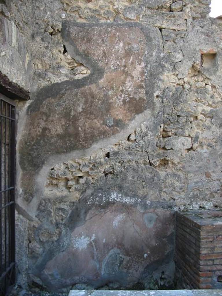 VI.10.1 Pompeii. December 2018. South wall of rear room, at west end, with frescoes. Photo courtesy of Aude Durand.