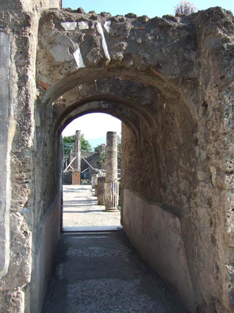 VI.12.2 Pompeii. September 2005. Corridor, on east side of oecus/triclinium, looking south to middle peristyle.
