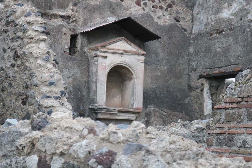VI.12.2 Pompeii. December 2018.
Looking towards north wall of kitchen with arched niche lararium, and east wall with window. Photo courtesy of Aude Durand.