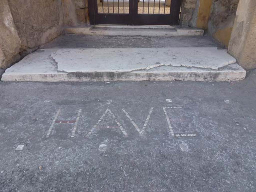 VI.12.2 Pompeii. June 2012. Entrance threshold or sill, with HAVE (Welcome) written in the pavement. Photo courtesy of Michael Binns.
