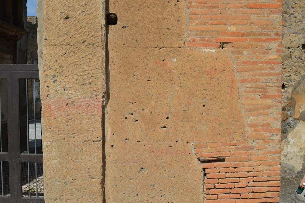 VI.12.2 Pompeii. March 2018. Detail of remaining red painted graffiti on pilaster on east (right) side of entrance doorway.
Foto Taylor Lauritsen, ERC Grant 681269 DÉCOR.