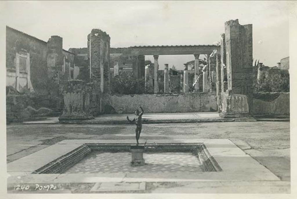 VI.12.2 Pompeii. March 1939 during a stop on SS Carinthia world cruise. Looking north across the impluvium in atrium. Photo courtesy of Rick Bauer.