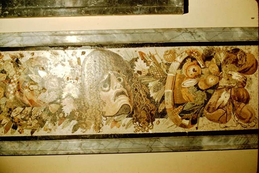 VI.12.2 Pompeii. 1957. Detail from mosaic of two tragic masks, with fruits, flowers and garlands. Photo by Stanley A. Jashemski.
Source: The Wilhelmina and Stanley A. Jashemski archive in the University of Maryland Library, Special Collections (See collection page) and made available under the Creative Commons Attribution-Non Commercial License v.4. See Licence and use details.
J57f0531