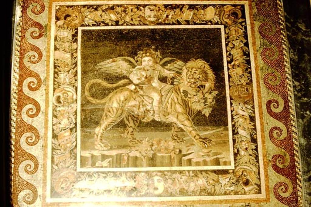 VI.12.2 Pompeii. 1957. Mosaic of the child Dionysus astride an animal with the head of a lion and the body of a tiger. Photo by Stanley A. Jashemski.
Source: The Wilhelmina and Stanley A. Jashemski archive in the University of Maryland Library, Special Collections (See collection page) and made available under the Creative Commons Attribution-Non Commercial License v.4. See Licence and use details.
J57f0533