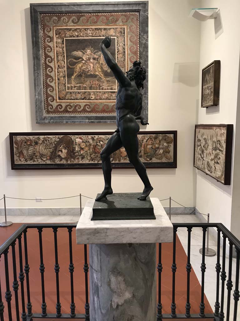 VI.12.2 Pompeii. April 2019. Display of mosaics from the House of the Faun, seen in Naples Museum.
The mosaic of the child Dionysus astride an animal is seen here to demonstrate the size of the floor emblema.
Photo courtesy of Rick Bauer.
