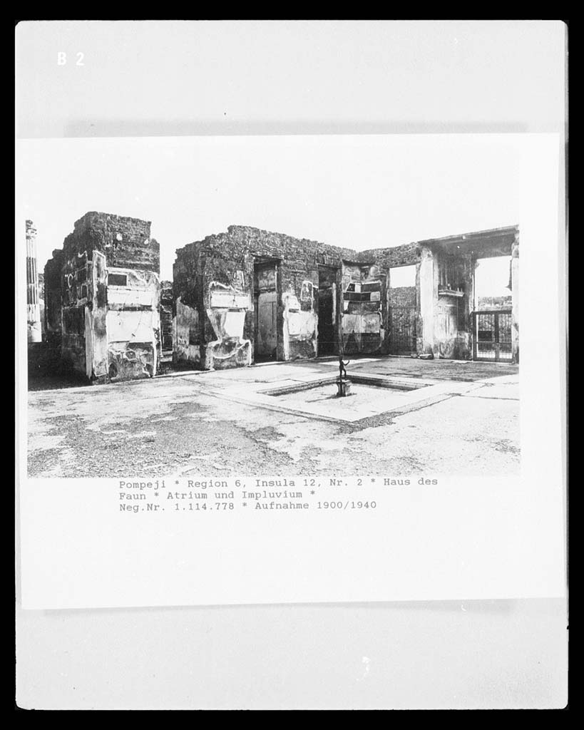VI.12.2 Pompeii. 1920-1939?
Looking south-east across atrium, east ala 30, on left, and doorway to west ala 11 of VI.12.5, centre left, followed by two cubicula, 10 and 28.
Photo © Bildarchiv Foto Marburg / Foto: unbekannt; Aufn.-Datum: um 1920/1939? Aufnahme-Nr. 1.114.778 (Vorschaubild)