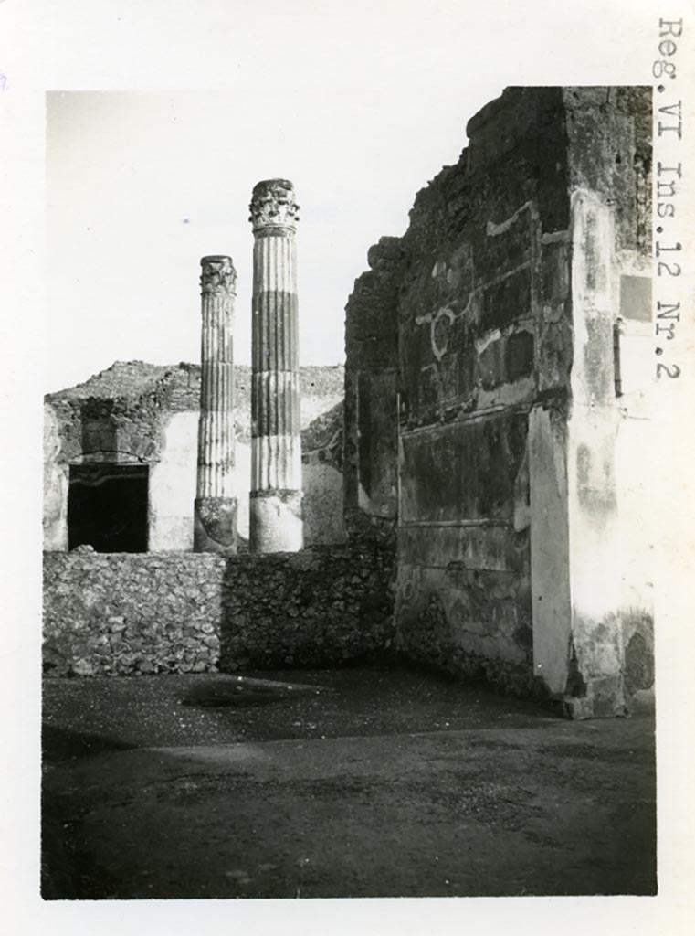 VI.12.2 Pompeii. Pre-1937-39.
Ala 30, on east side of atrium, looking towards south-east corner, with atrium of VI.12.5 at rear.
Photo courtesy of American Academy in Rome, Photographic Archive. Warsher collection no. 031.