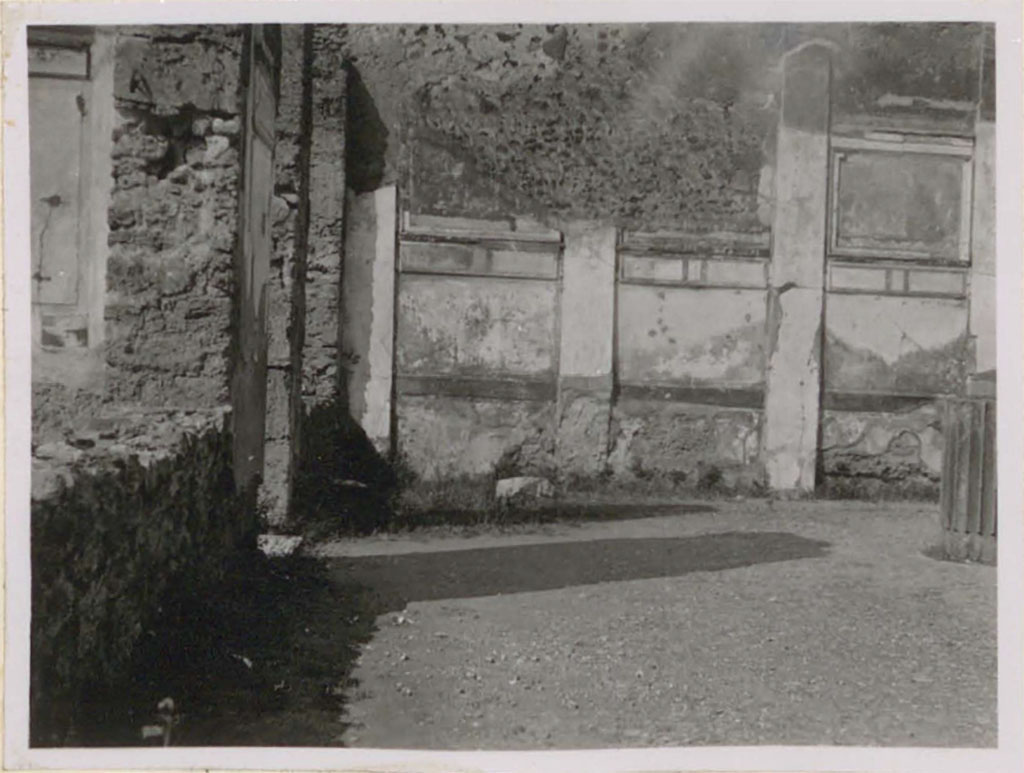 VI.12.2 Pompeii. Pre-1942. 
Looking west along the south portico towards the south-west corner of the middle peristyle/garden.
On the left would the tablinum rear wall, and doorway and window of triclinium on the left (west side) of the tablinum.
See Warscher, T. (1946). Casa del Fauno, Swedish Institute, Rome. (p.34, n.46).

