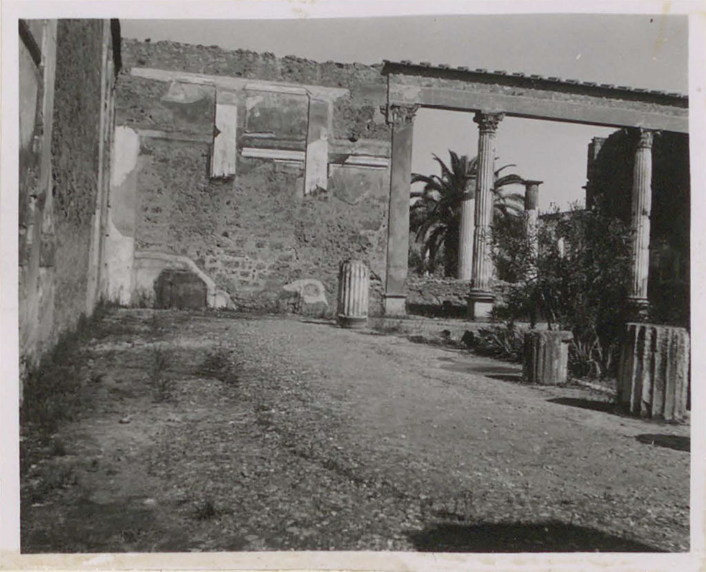 VI.12.2 Pompeii. Pre-1943.
Looking north along the west portico towards north-west corner of middle peristyle/garden.
See Warscher, T. (1946). Casa del Fauno, Swedish Institute, Rome. (p.35, n.49).