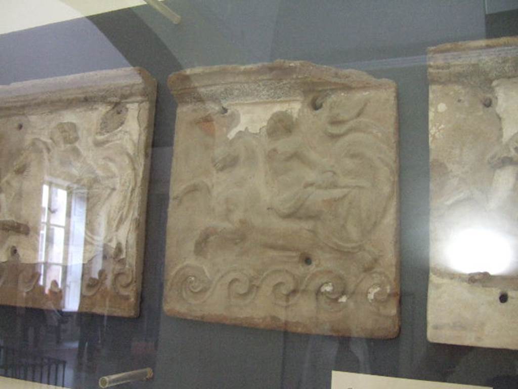 VI.12.2 Pompeii. Terracotta facing with Nereid on a sea horse. Found in first peristyle. Now in Naples Archaeological Museum. Inventory number 21517.