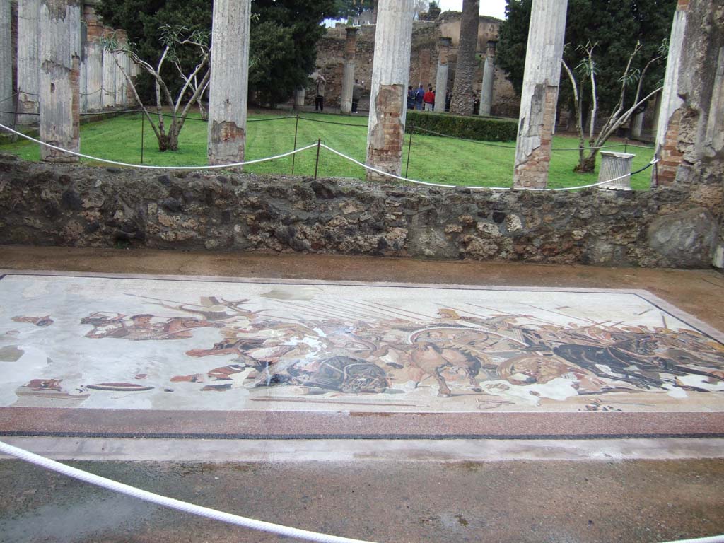 VI.12.2 Pompeii. December 2005. Looking north to rear peristyle across recreated Alexander mosaic in exedra. 
