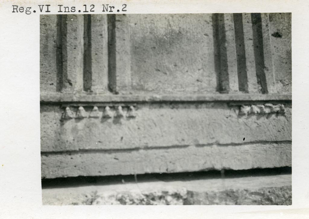 VI.12.2 Pompeii. pre-1937-1939. Detail from decorated pediments, on right of the photo above.
Photo courtesy of American Academy in Rome, Photographic Archive. Warsher collection no. 464.
