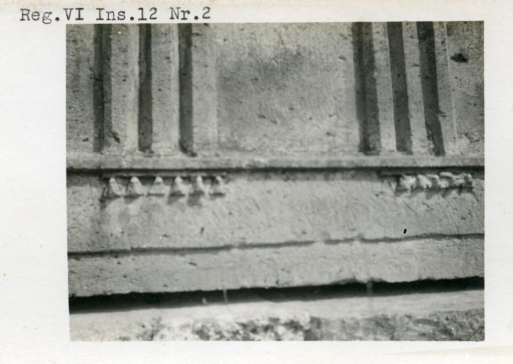 VI.12.2 Pompeii. pre-1937-1939. Detail from decorated pediments, on right of the photo above.
Photo courtesy of American Academy in Rome, Photographic Archive. Warsher collection no. 464.