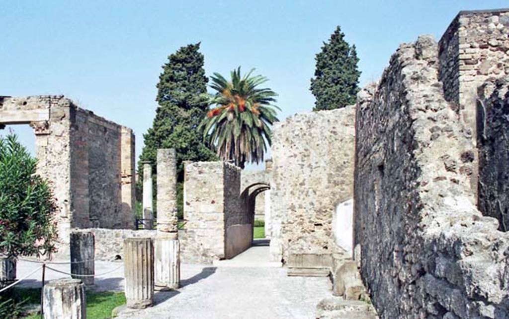 VI.12.2 Pompeii. October 2001. Looking north from east portico of middle peristyle, towards corridor and oecus, centre left.  On the right can be seen the corridor to the Second or Rear peristyle. Photo courtesy of Peter Woods.
