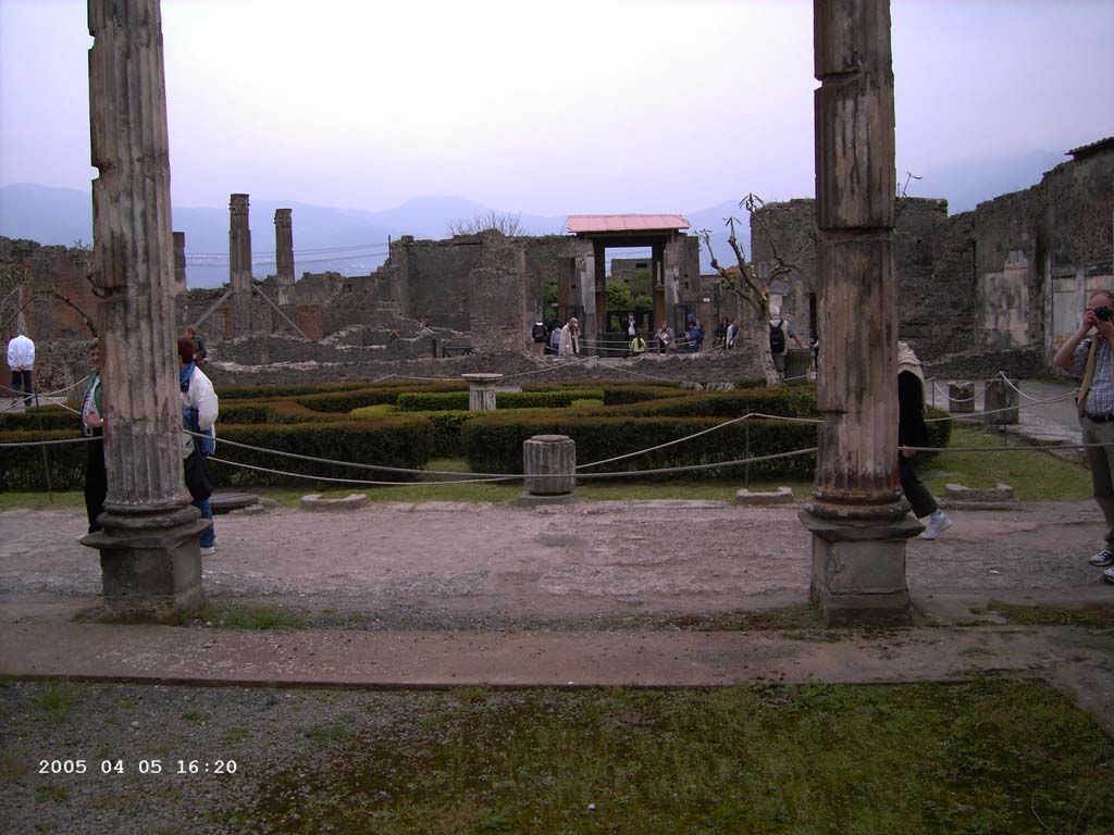 VI.12.2 Pompeii. April 2005. Looking south from exedra with(out) Alexander mosaic onto middle peristyle, and across towards atrium.
Photo courtesy of Klaus Heese.