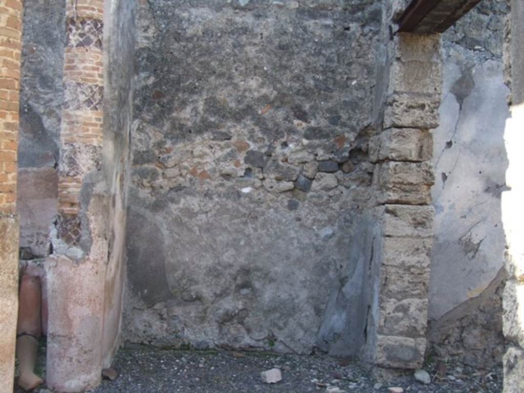 VI.14.22 Fullonica of Balbinus. December 2007. Room 12. west end of peristyle. Door on right to room 13.