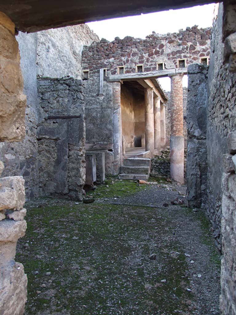VI.14.22 Pompeii. December 2007.
Room 5, looking west to peristyle which has been converted with vats for fulling.