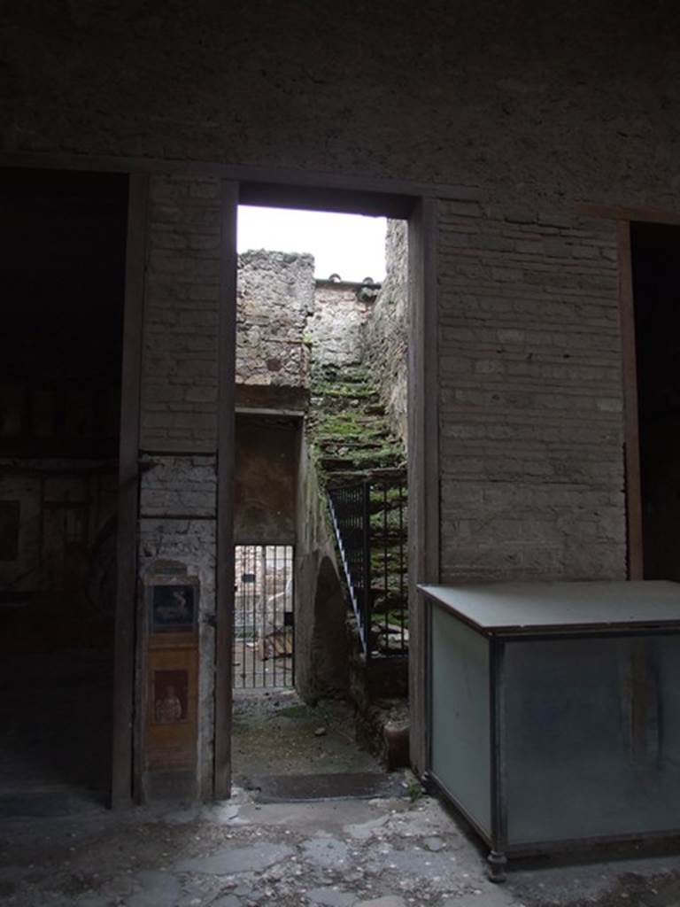 VI.15.1 Pompeii. December 2006. Looking south from atrium, towards room with steps to upper floor and corridor leading to stable entrance at VI.15.27.
