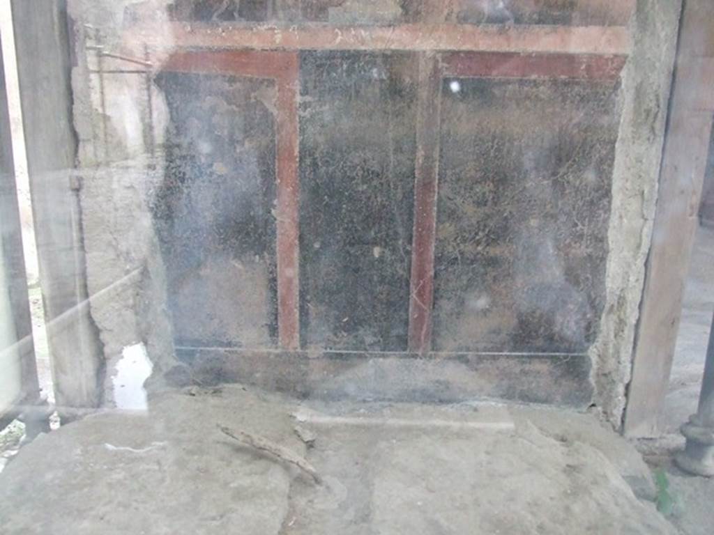 VI.15.1 Pompeii. December 2006. Looking into glass case on south side of atrium. This contained the remains of an iron and bronze strongbox or safe. This was being restored as at Dec 2006. Painting on rear wall was dated by Mau to be pre 63 AD. Maiuri did not agree. See Mau, A., 1907, translated by Kelsey F. W. Pompeii: Its Life and Art. New York: Macmillan. (p.327).