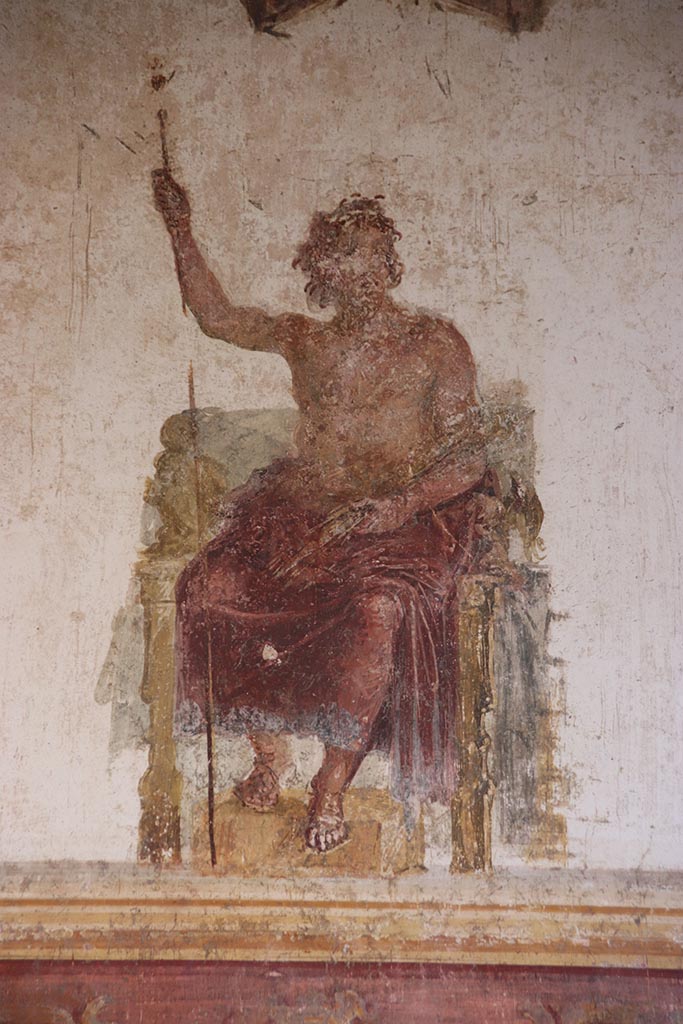 VI.15.1 Pompeii. October 2024.
Upper centre of west wall of oecus, detail of painted figure of Zeus. Photo courtesy of Klaus Heese