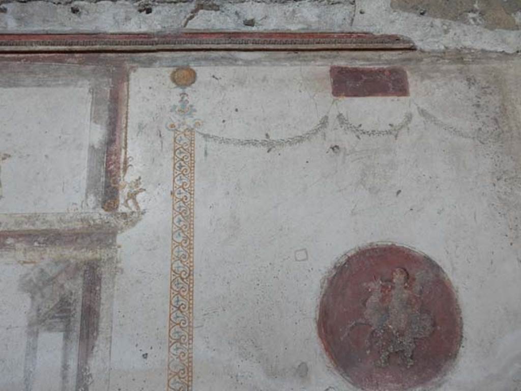 VI.15.1 Pompeii. May 2017. Detail from north end of west wall. Photo courtesy of Buzz Ferebee.