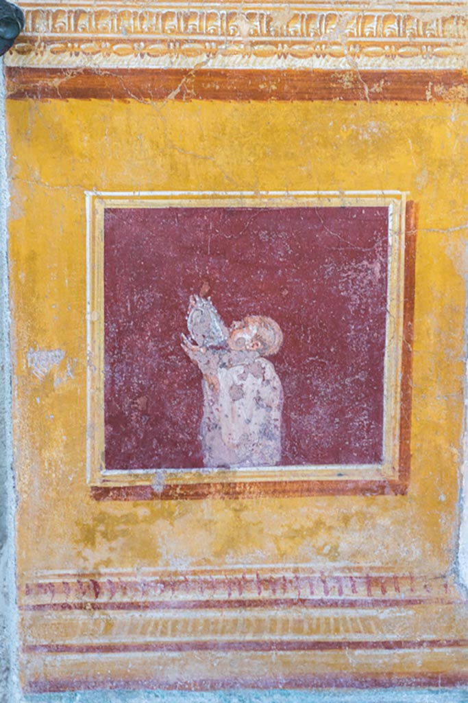 VI.15.1 Pompeii. March 2023.
South side of atrium, decorative panel between doorways of cubiculum f, on left, and ala h, on right.
Photo courtesy of Johannes Eber.