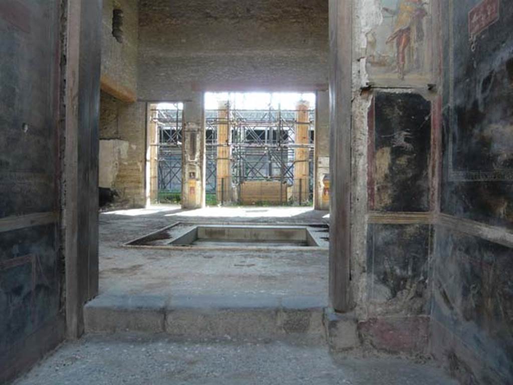 VI.15.1 Pompeii. May 2012. Looking west from vestibule (a) across atrium towards peristyle.
Photo courtesy of Buzz Ferebee.