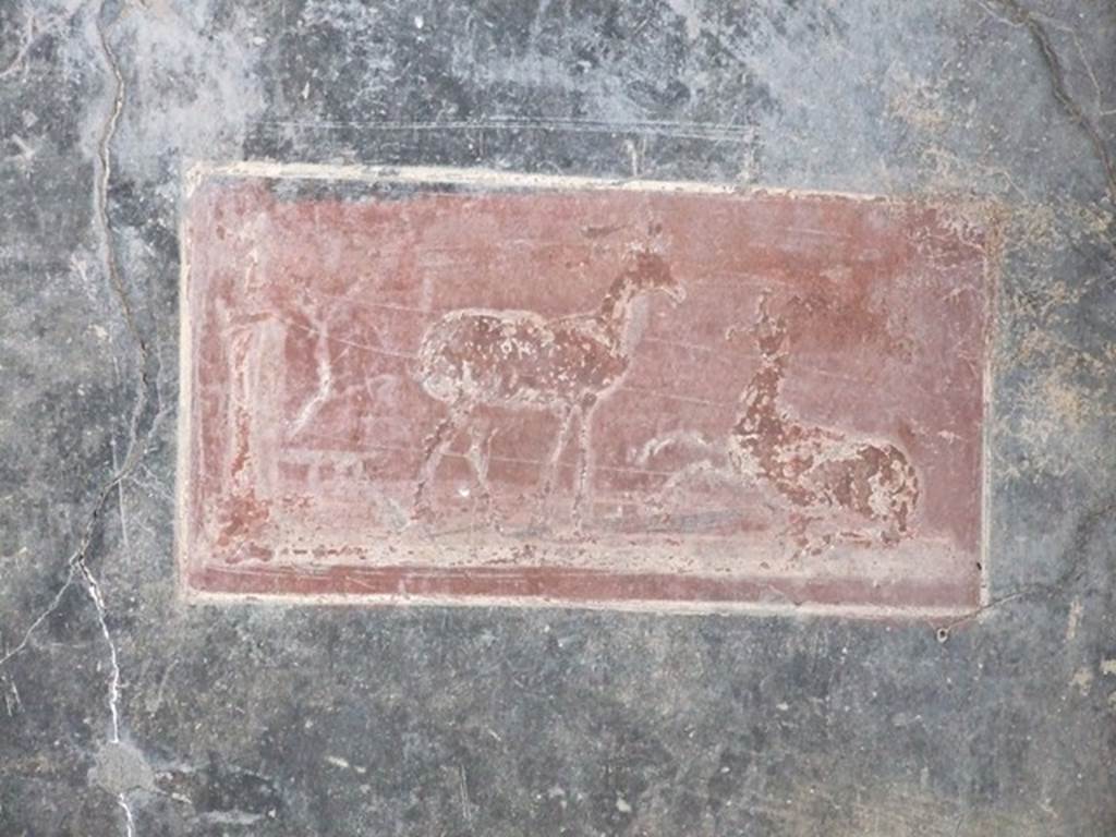 VI.15.1 Pompeii. December 2006. Painting in vestibule from north wall. According to Sogliano, the two black panels on the north wall also contained a small rectangular panel on a red background. This showed two deer and an idol placed on a pedestal.
Sogliano, A: La Casa dei Vettii in Pompei, 1898, (p.237)