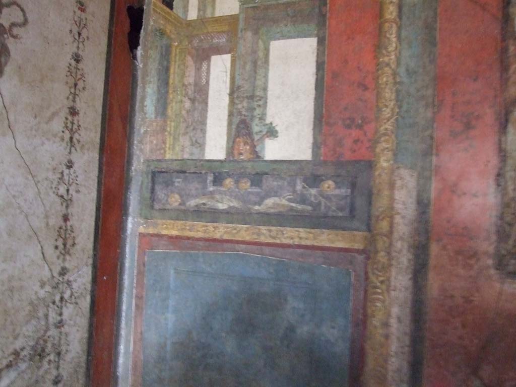 VI.15.1 Pompeii. December 2006. East wall of exedra, in north-east corner, with wall painting of food, with mask above.