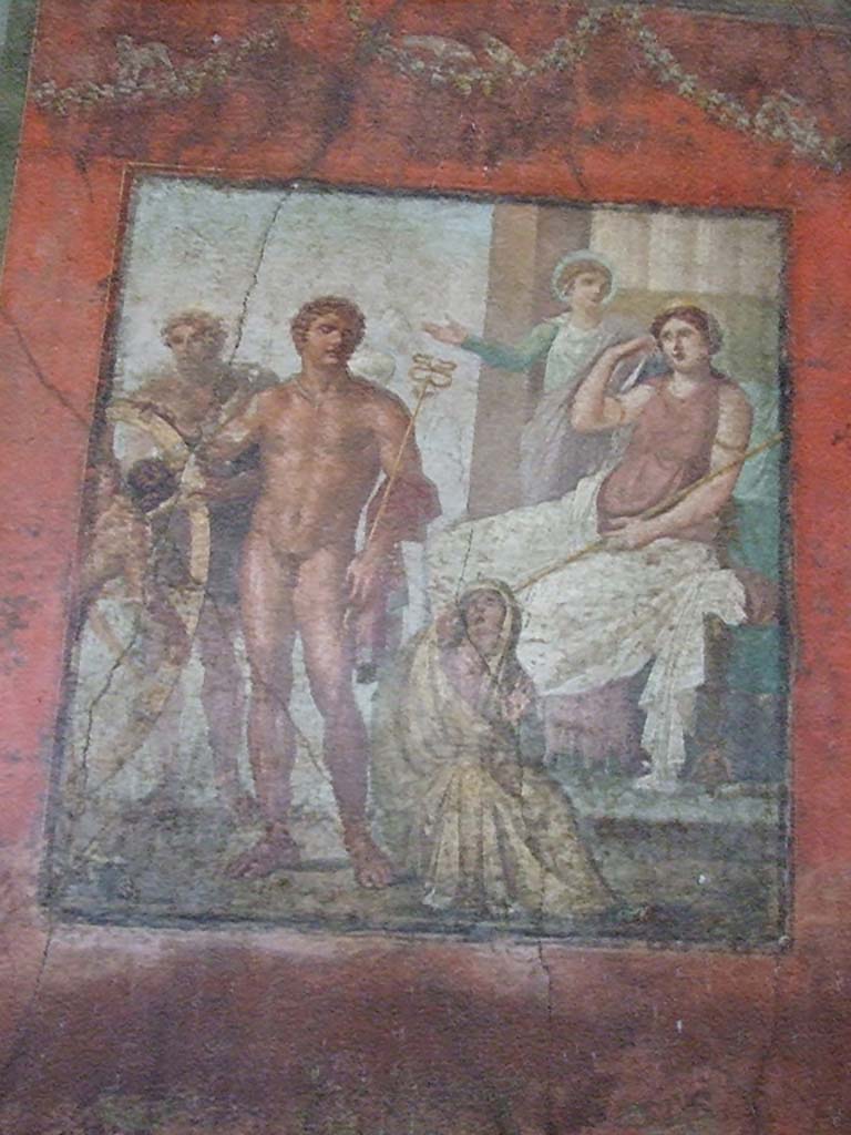 VI.15.1 Pompeii. December 2006. 
East wall of exedra with wall painting of the torture of Ixion on the wheel.
