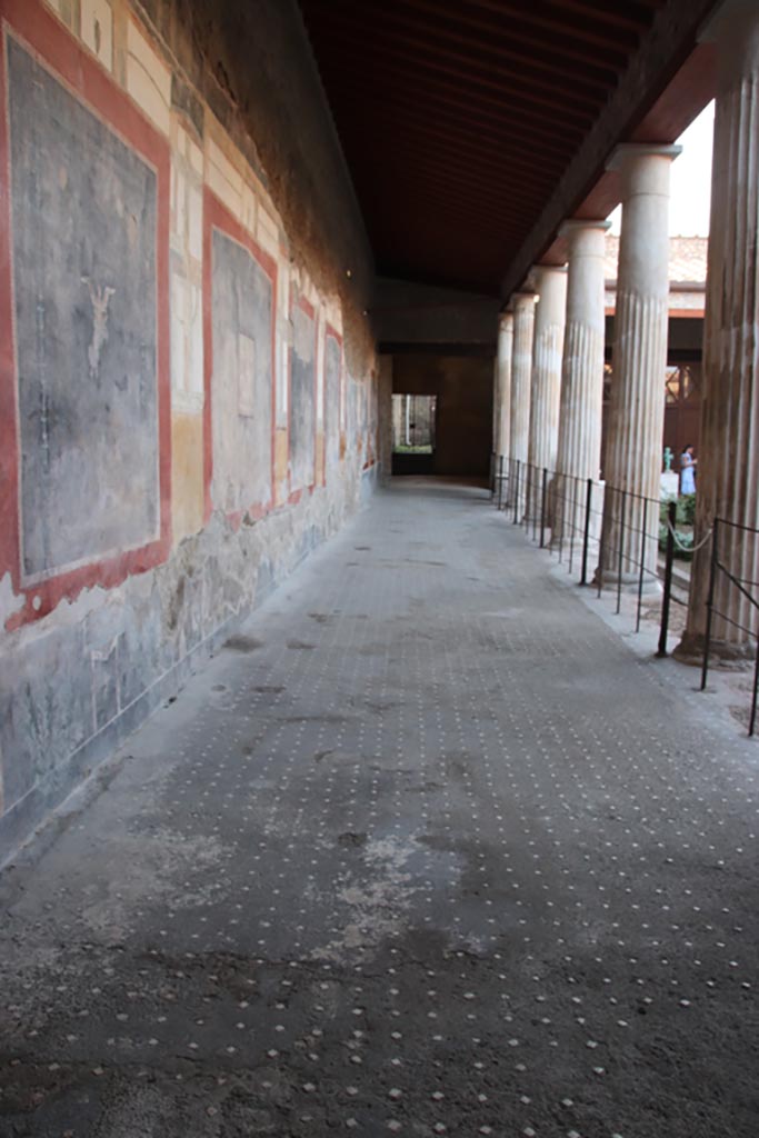 VI.15.1 Pompeii. October 2023.
Looking north along west portico of peristyle. Photo courtesy of Klaus Heese.