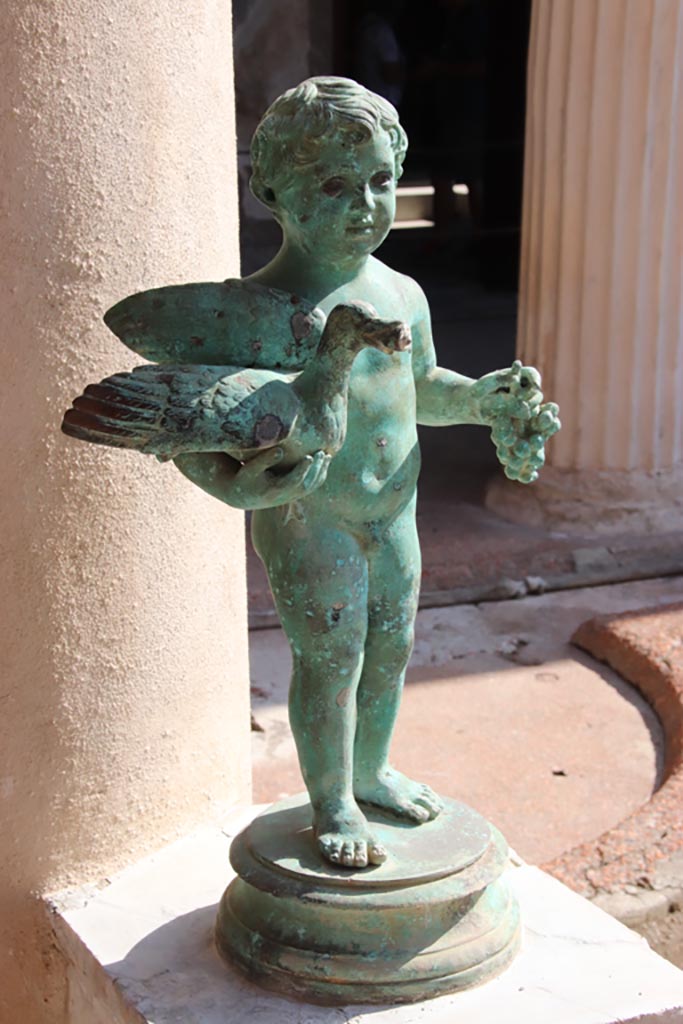 VI.15.1 Pompeii. October 2023.
Second bronze statuette, looking towards north-east corner. Photo courtesy of Klaus Heese.