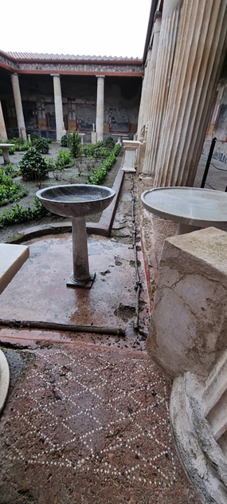 VI.15.1 Pompeii. January 2023.
Looking south along west side of peristyle. Photo courtesy of Miriam Colomer.
