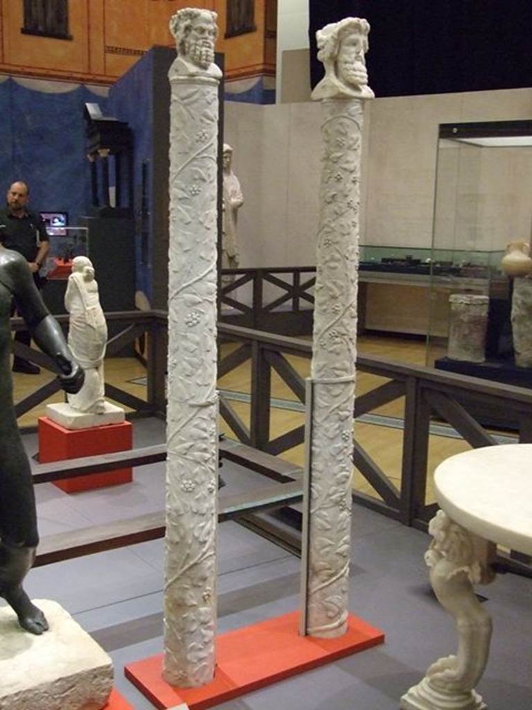 VI.15.1 Pompeii. Two marble herms, the pillars decorated with twining ivy. On top of each is a double bust. One represents Silenus and a bacchante (On the left). SAP 690. The other is Dionysus and Ariadne (On the right). SAP 691. Photographed at “A Day in Pompeii” exhibition at Melbourne Museum. September 2009.
