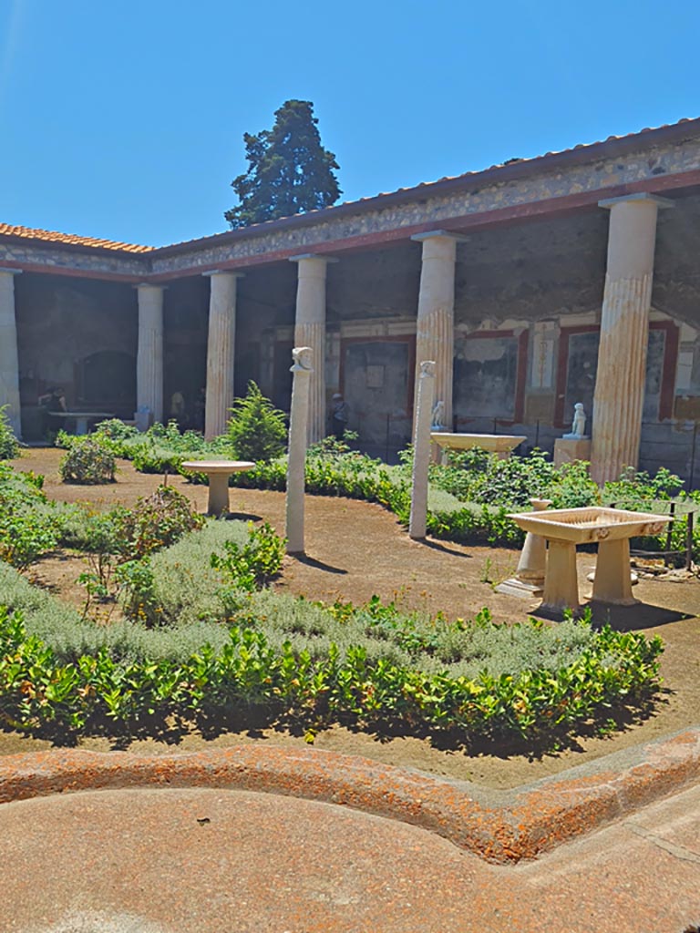 VI.15.1 Pompeii. June 2024.
Looking south-west across peristyle, from north-east portico. Photo courtesy of Giuseppe Ciaramella.