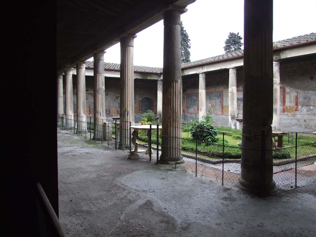 VI.15.1 Pompeii. December 2006. Looking south-west across peristyle, from exedra on north-east side.