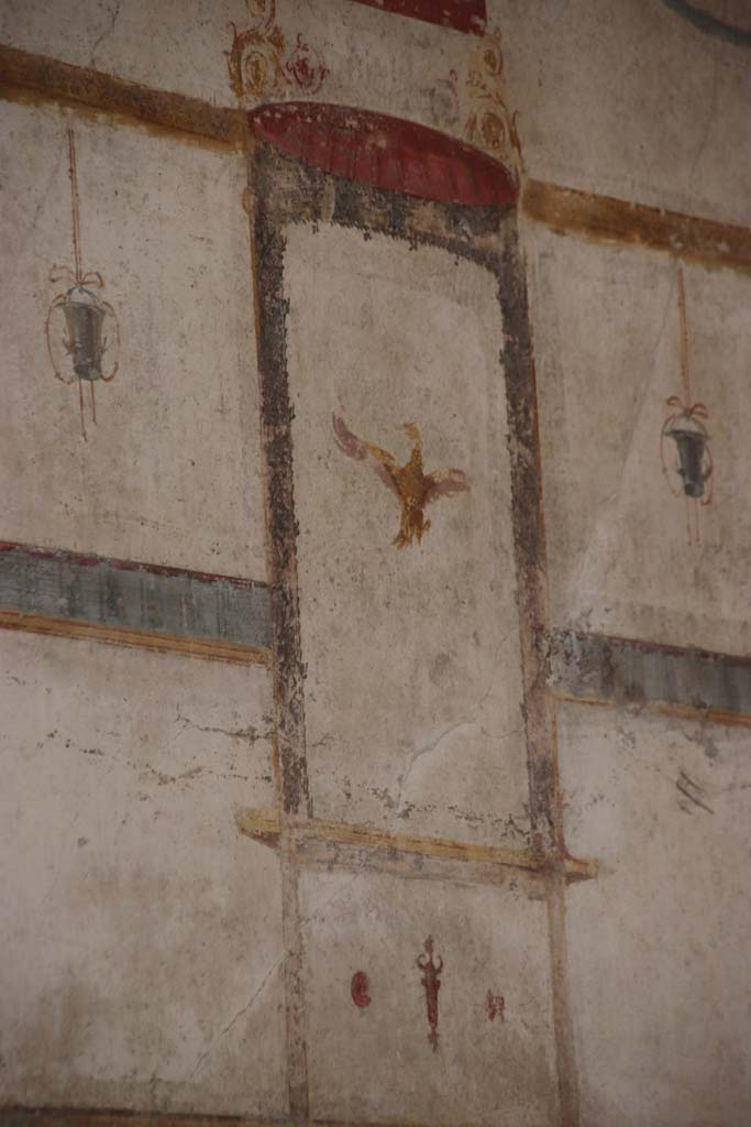 VI.16.7 Pompeii. September 2021.
Painted decoration from upper south wall in south-west corner. Photo courtesy of Klaus Heese.