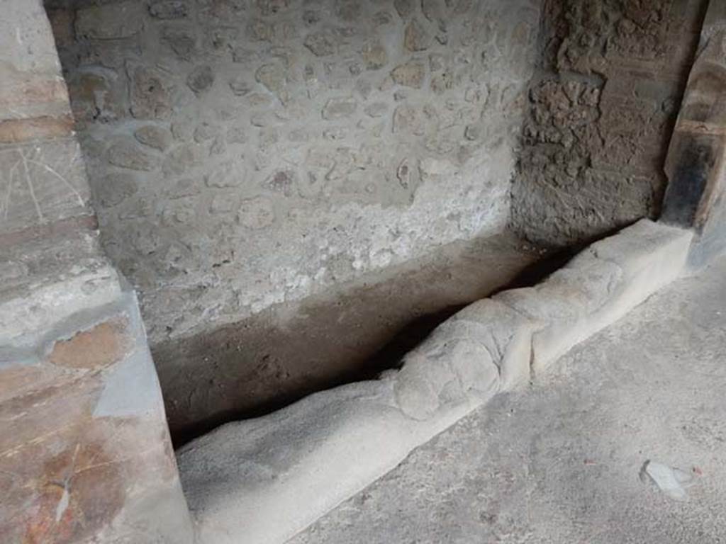 VI.16.7 Pompeii. May 2016. Shallow space 03, on east side of portico, detail of space originally filled with a wooden cupboard. Photo courtesy of Buzz Ferebee.