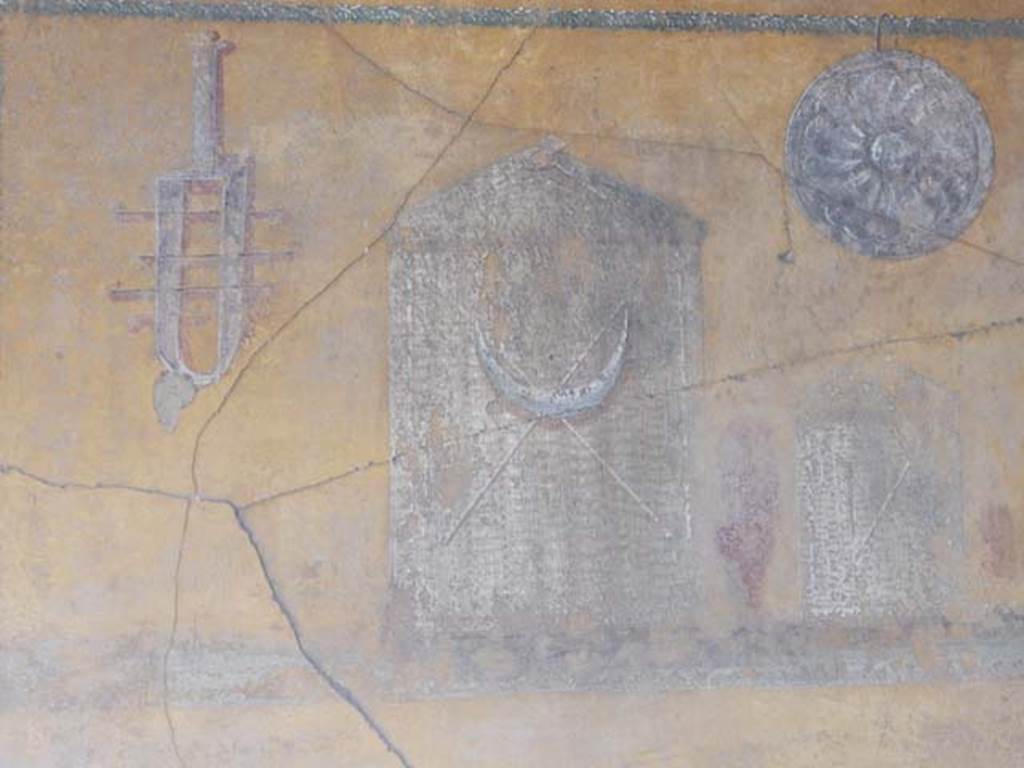 VI.16.7 Pompeii. May 2016. Room F, detail from east wall of lararium. Photo courtesy of Buzz Ferebee.