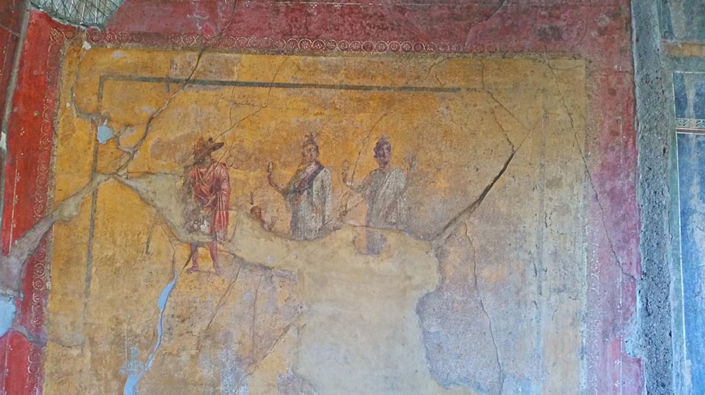 VI.16.7 Pompeii. December 2019.
Room F, painting of the gods on the lararium on the south wall in the south-east corner of the peristyle. Photo courtesy of Giuseppe Ciaramella.