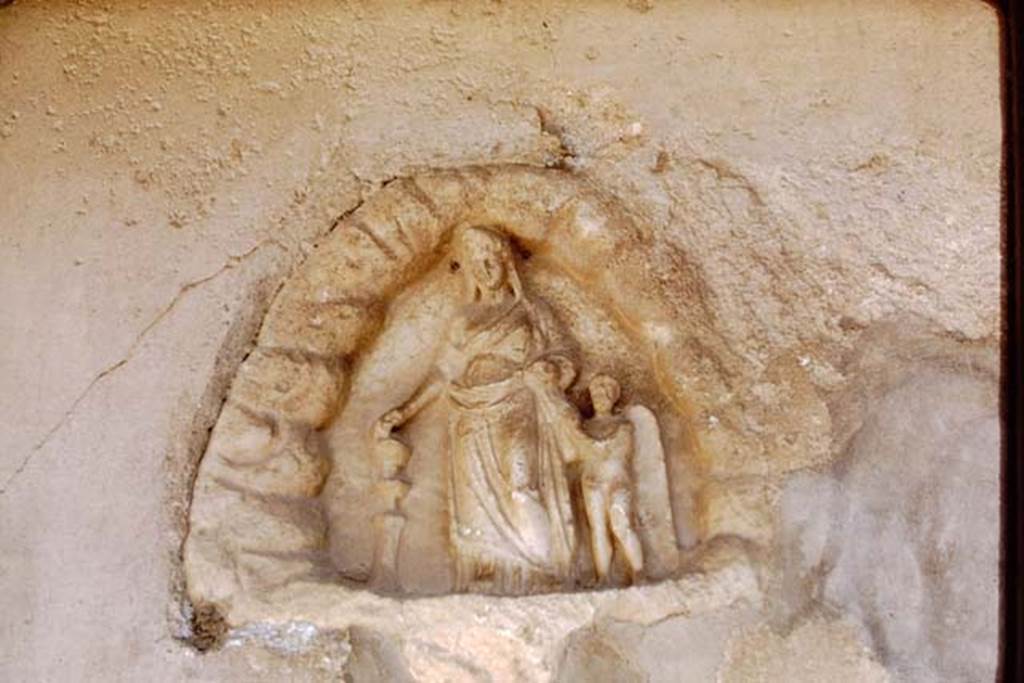 VI.16.7 Pompeii, 1968. Relief of Venus and cupid at the entrance to a grotto (0.32m high, with traces of original colour). Found set in the south wall of the peristyle. Photo by Stanley A. Jashemski.
Source: The Wilhelmina and Stanley A. Jashemski archive in the University of Maryland Library, Special Collections (See collection page) and made available under the Creative Commons Attribution-Non Commercial License v.4. See Licence and use details. J68f0070
See Jashemski, W. F., 1993. The Gardens of Pompeii, Volume II: Appendices. New York: Caratzas. (p.163)